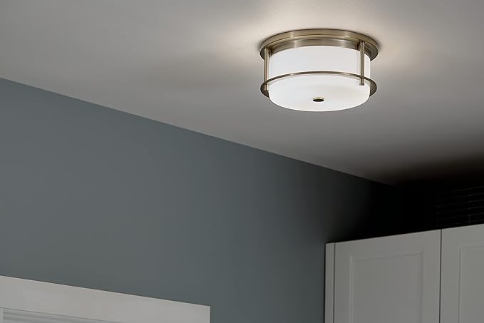 Kichler Brit 2-Light Flush Mount Ceiling Light, Industrial Modern Ceiling Light with Satin Etched Cased Opal Glass in Champagne Bronze, (12" W x 5.5" H), 52595CPZ