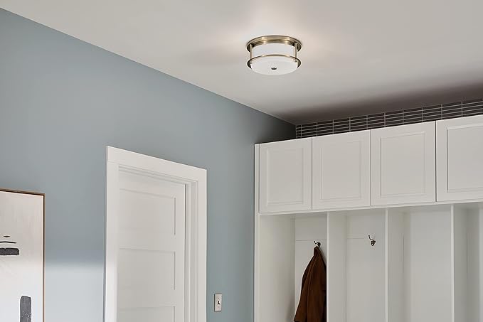 Kichler Brit 2-Light Flush Mount Ceiling Light, Industrial Modern Ceiling Light with Satin Etched Cased Opal Glass in Champagne Bronze, (12" W x 5.5" H), 52595CPZ