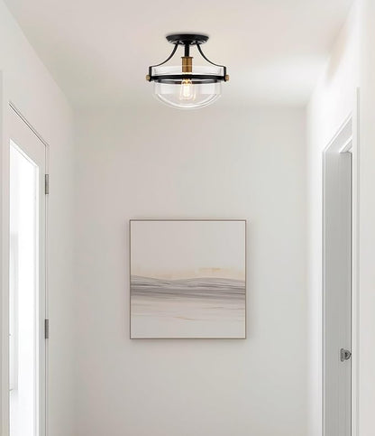 Kira Home Zurich 12" Modern Industrial Semi-Flush Mount Ceiling Light, Two-Tone Fixture with Clear Glass Schoolhouse Bowl Shade, Warm Brass and Black Finish