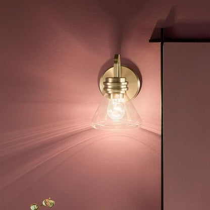 Kichler Farum 7.25" 1-Light Wall Sconce Bathroom Vanity Light Fixture with Clear Glass in Champagne Bronze for Modern Lighting Over Mirror (7.25" W x 9.5" H) 55153CPZCLR