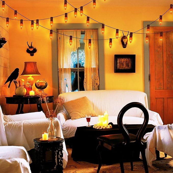 Abeja 25Ft C7 Orange String Lights with 27 Clear Orange Bulbs (2 Spare) - Vintage Halloween String Lights on Black Wire for Patio, Party & Spooky Decor