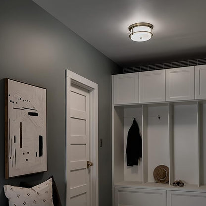 Kichler Brit 2-Light Flush Mount Ceiling Light, Industrial Modern Ceiling Light with Satin Etched Cased Opal Glass in Champagne Bronze, (12" W x 5.5" H), 52595CPZ